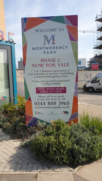 Outdoor sign promoting new homes for sale